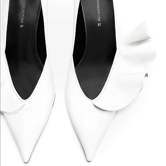 white leather court shoes